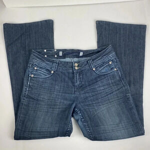 Dark wash medium rise whiskered Blue flared leg pullon  jeans size 8